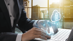 Businessman using laptop with padlock